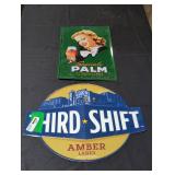 Vintage metal beer signs.
