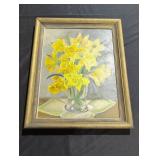 Framed painting of flowers in vase.