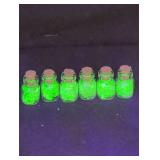6 Tiny jars filled with Uranium glass
