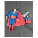 Toy superman and a Superman ornament.