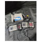 Retro Gaming Console with Controllers and Cables