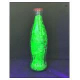 Glass Coca-Cola bottle filled with Uranium glass