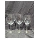 Trio of wine glasses.
