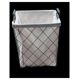 Pink laundry hamper.
