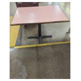 Pink Table with Black Pedestal Base