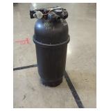 Black plastic pool sand filter tank