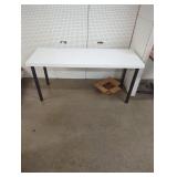 White Table with Black Legs