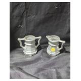 Pair of silver colored Miniature Pitchers