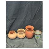 Set of Four Decorative Clay Pots