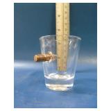 bullet in a shot glass