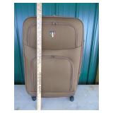 new suitcase Tucci design 24 inch 7.4 lbs.