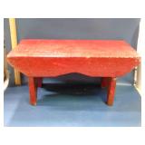 primitive wooden red stool