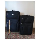 pair of Concourse suitcases