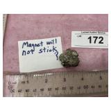CHUNK OF SOMETHING A MAGNET WILL NOT STICK TO IT