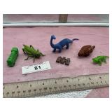 PLASTIC  DINOSAURS AND BUGS