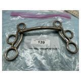 VINTAGE BUTTERFLY HORSE BIT WITH A CURVED SOLID