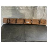 5 HORSESHOE HANGER ON 48' BOARD