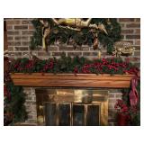 Garland with red berries over mantle