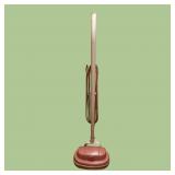 Pink vintage Hoover floor polisher