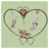 heart-shaped stand with hanging photo angels