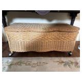 Wicker storage bin  on wheels