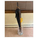 Glass jar , umbrella , and cane