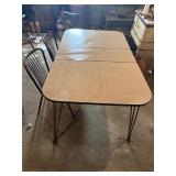 Vintage metal leg table with two chair chairs