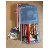 Large tote of wrapping paper and ribbon