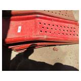Three Red Metal Traction Boards