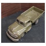 Vintage Pressed Steel Toy is a Buddy L Army