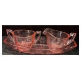 pink depression glass sugar and creamer set with