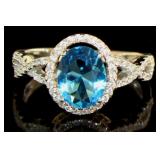 Oval 2.11 ct Blue Topaz Infinity Ring