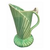 Rare Shell Pottery Pitcher