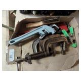 2 pipe wrenches, clamps and brush