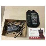 2 diagnostic testers, battery charger