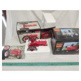 Ertl Precision Farmall Super M and display case Ertl Precision Farmall Super M and display case