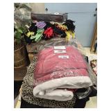 Assortment of blankets and comforters