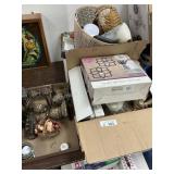 3 boxes of candles and holders