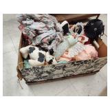 Box of stuffed dolls