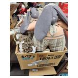 Box of stuffed dolls