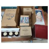 Snow globes, figures and candles