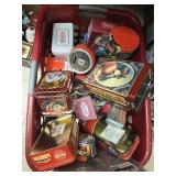 Assortment of Coca Cola tins and baskets