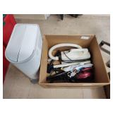 2 vacuums and waste bin