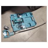 Makita vibrator with batteries and charger
