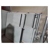 8  cubicles with desks and cabinets