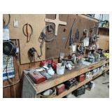 Contents of work bench and wall behind