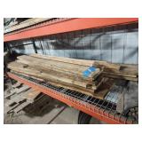 Boards on first shelf of rack