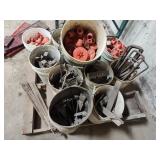 Pallet of caps, brackets, and other