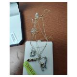 4 gold necklaces marked 10k