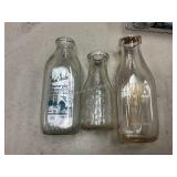 3 Milk bottles